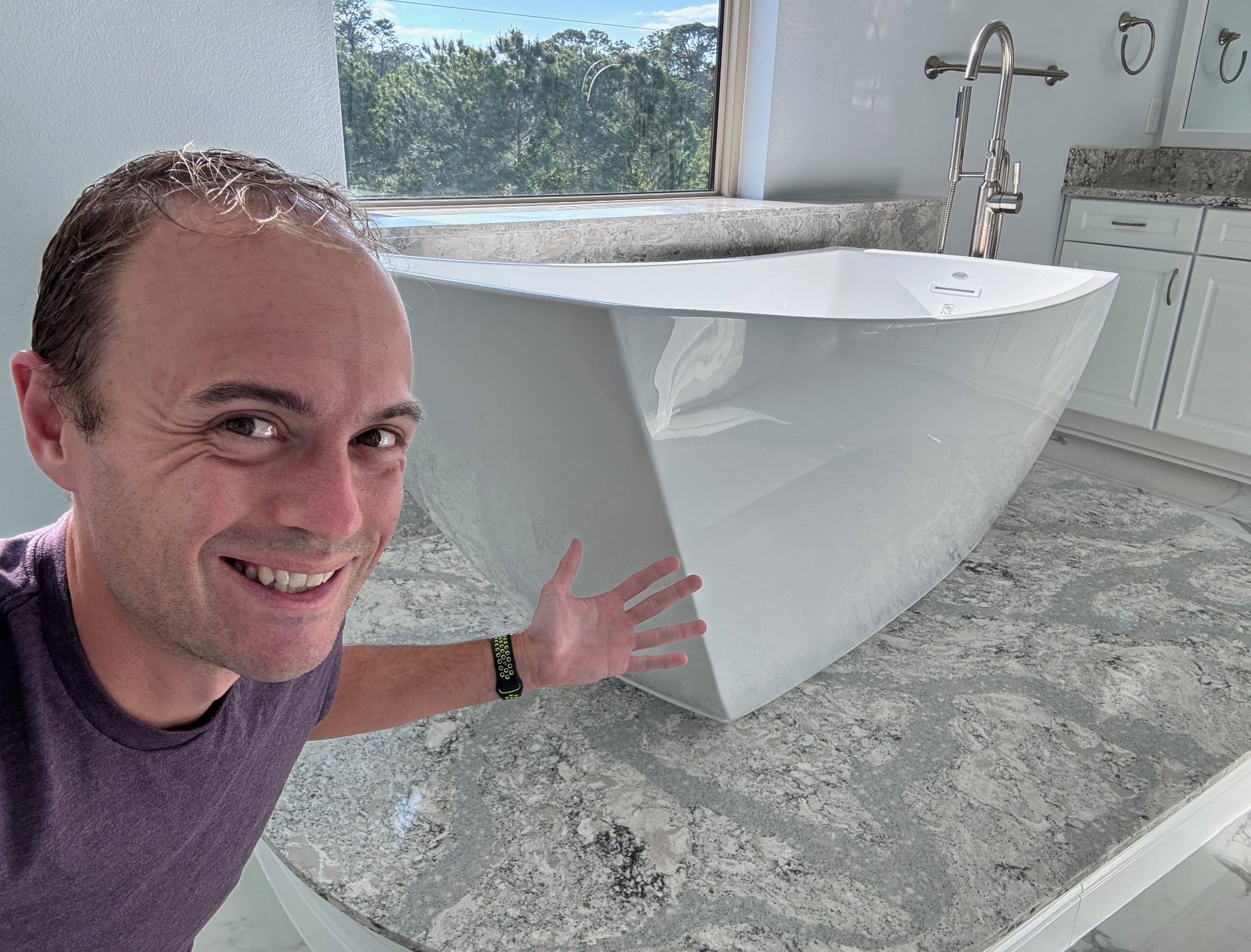 Justin and his new, much-too-expensive free-standing bath tub